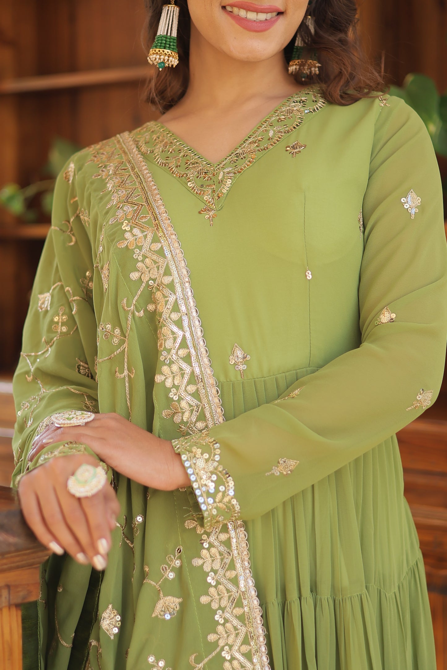 Elegant Faux Georgette Gown with 12-Meter Flair & Embroidered Dupatta – Designer V-Neck & Frill Stitching