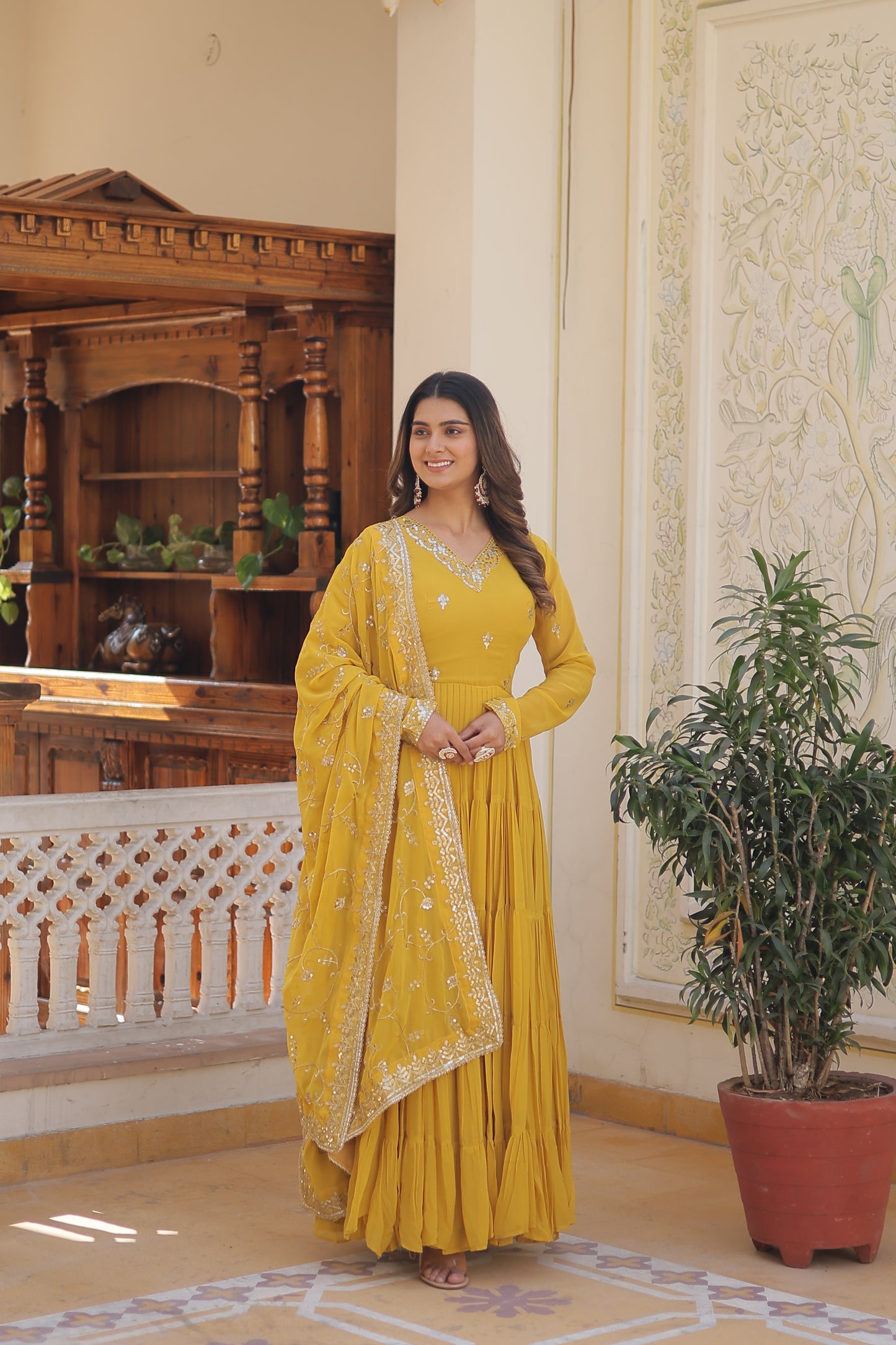 Elegant Faux Georgette Gown with 12-Meter Flair & Embroidered Dupatta – Designer V-Neck & Frill Stitching