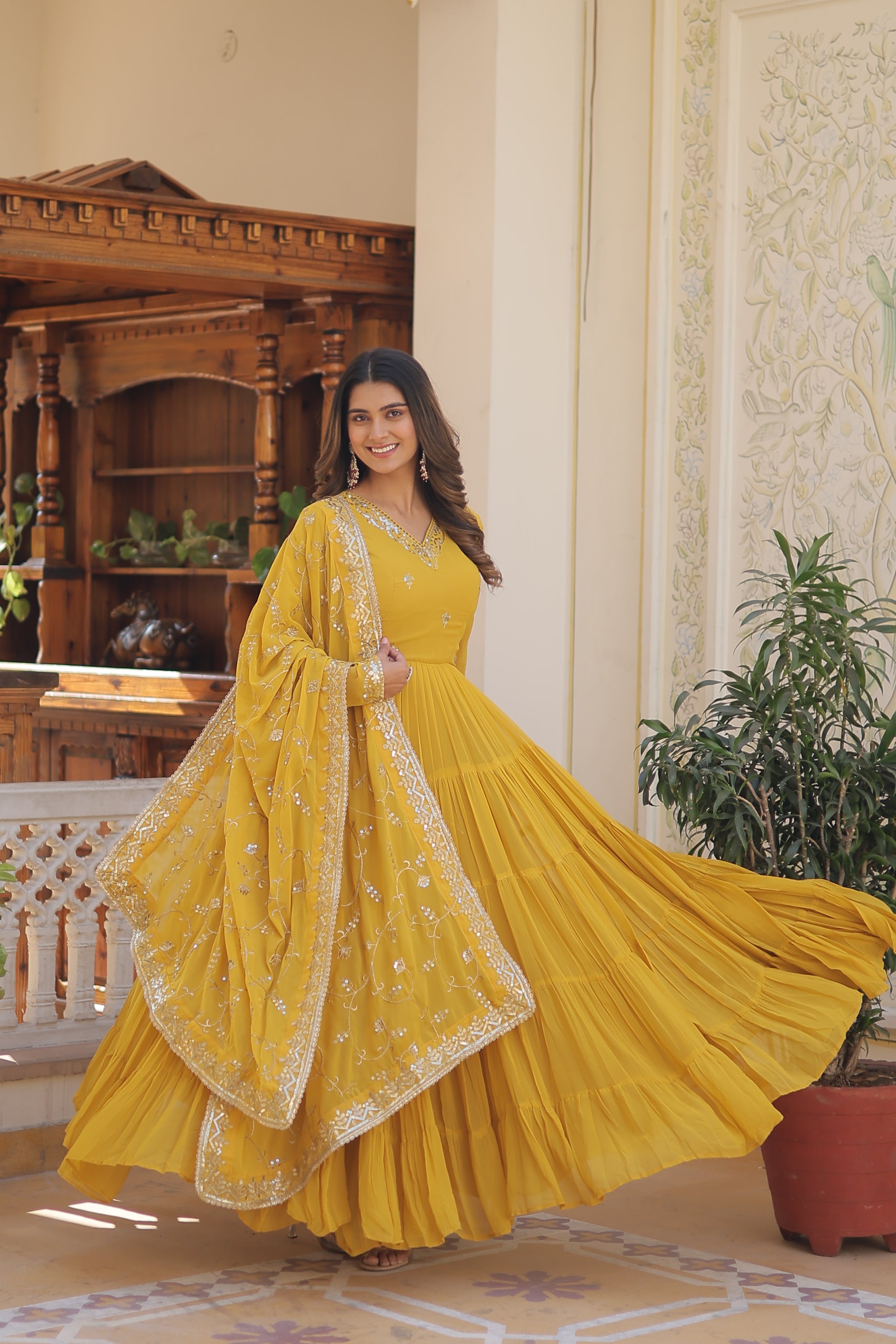 Elegant Faux Georgette Gown with 12-Meter Flair & Embroidered Dupatta – Designer V-Neck & Frill Stitching