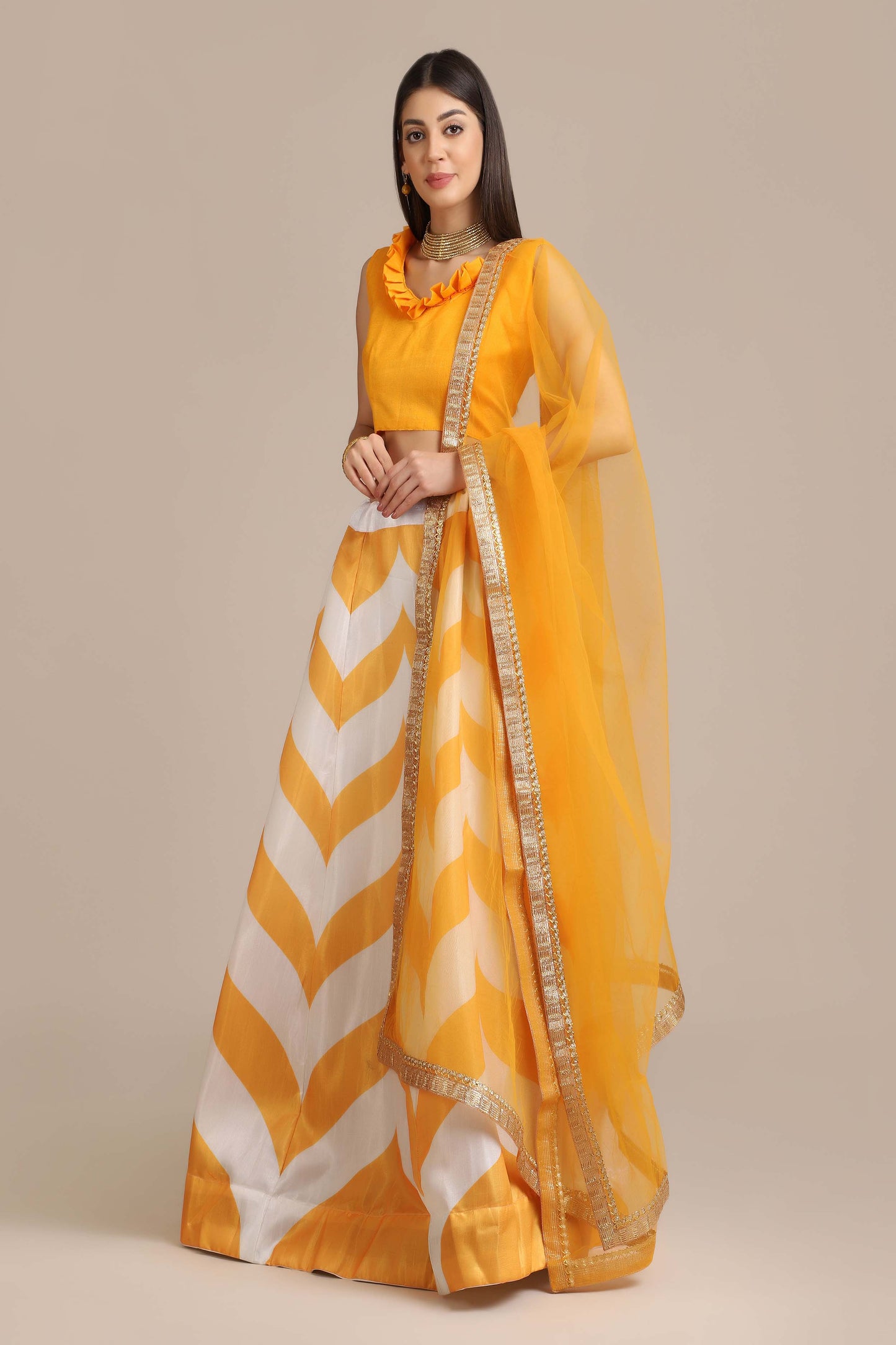 Yellow Banglory Silk Bold Chevron Pattern Print Lehenga Choli with Net Lace Work Dupatta