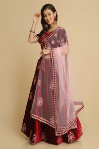 Embroidered Velvet Lehenga Choli In Peach And Red