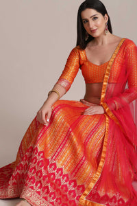 Red-Orange Shartin Silk Platted Laddi Motif Lehenga with Jacquard Bundi Butta Choli with Net Fringe Dupatta