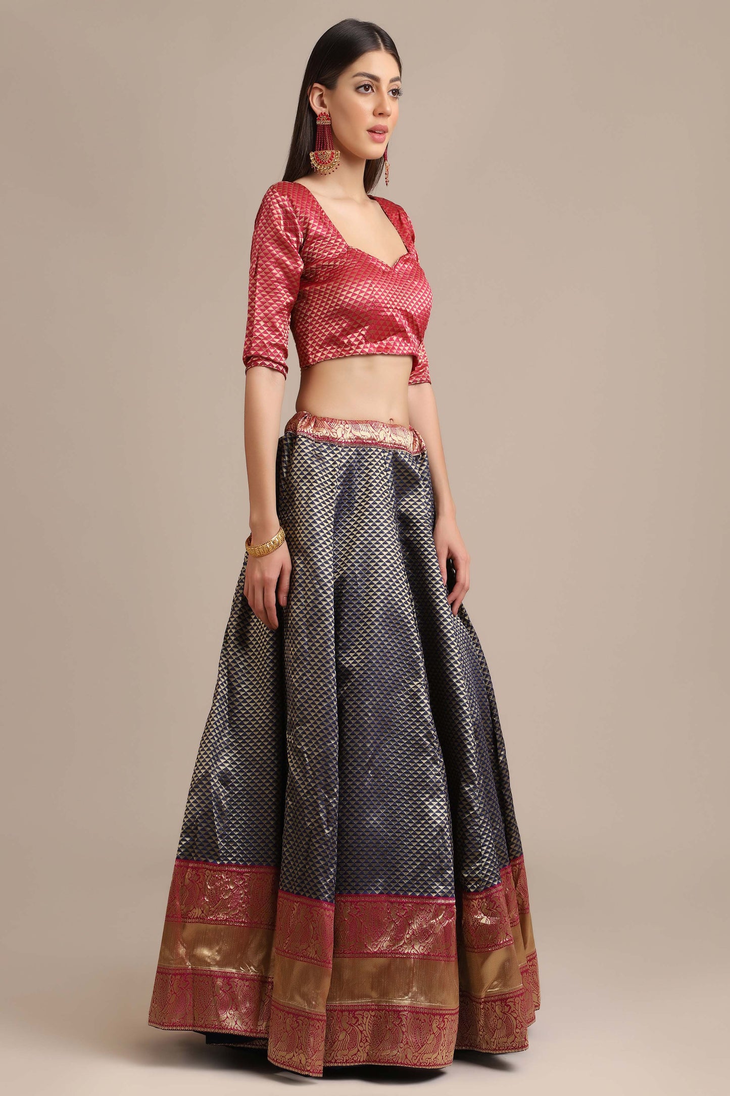 Jacquard Silk All-Over Golden Zari Woven Seamless Triangle Motif Blue Lehenga with Red Choli and Net Dupatta