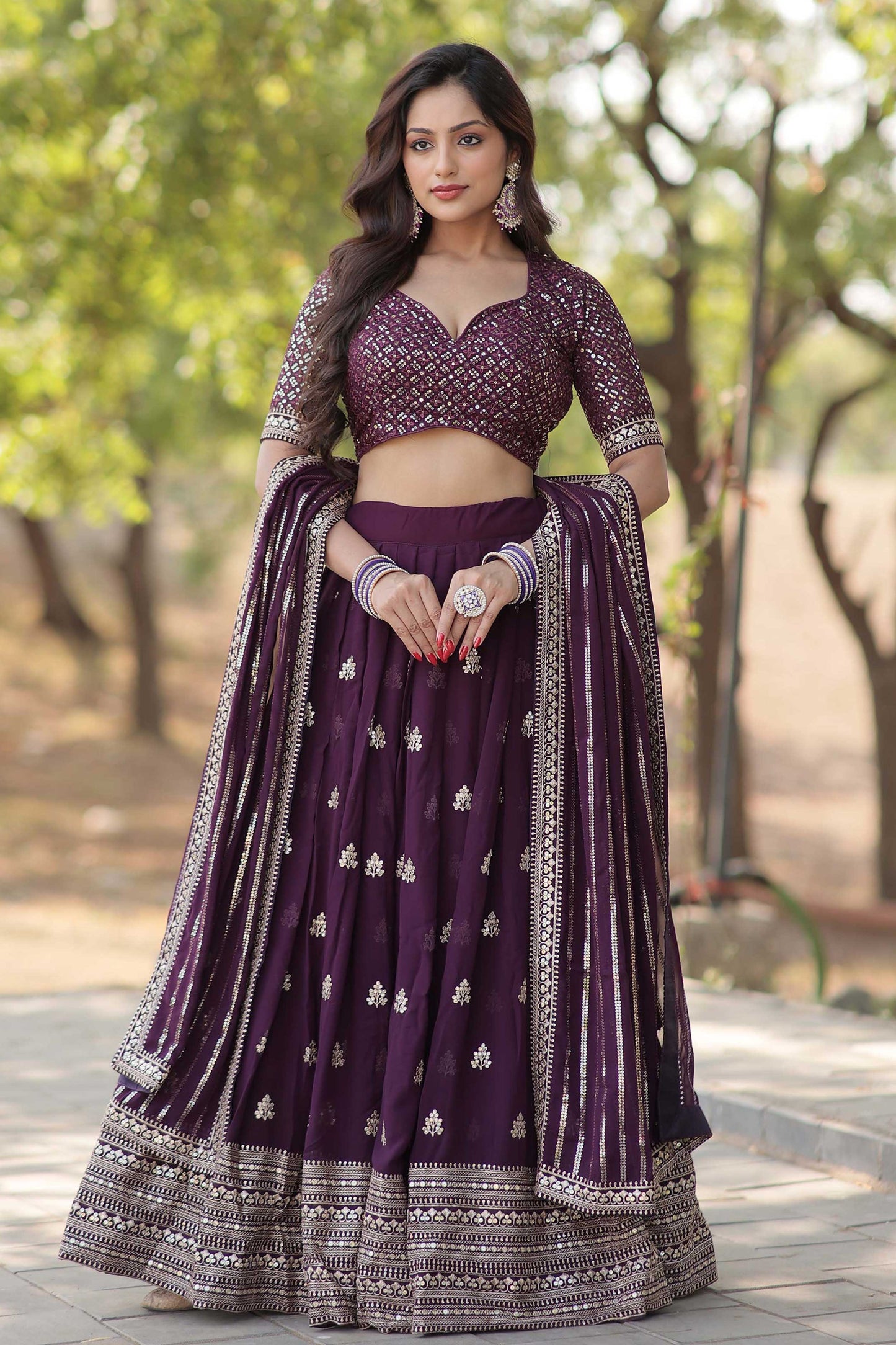 Embroidered Flared Lehenga Choli Set with Dupatta.