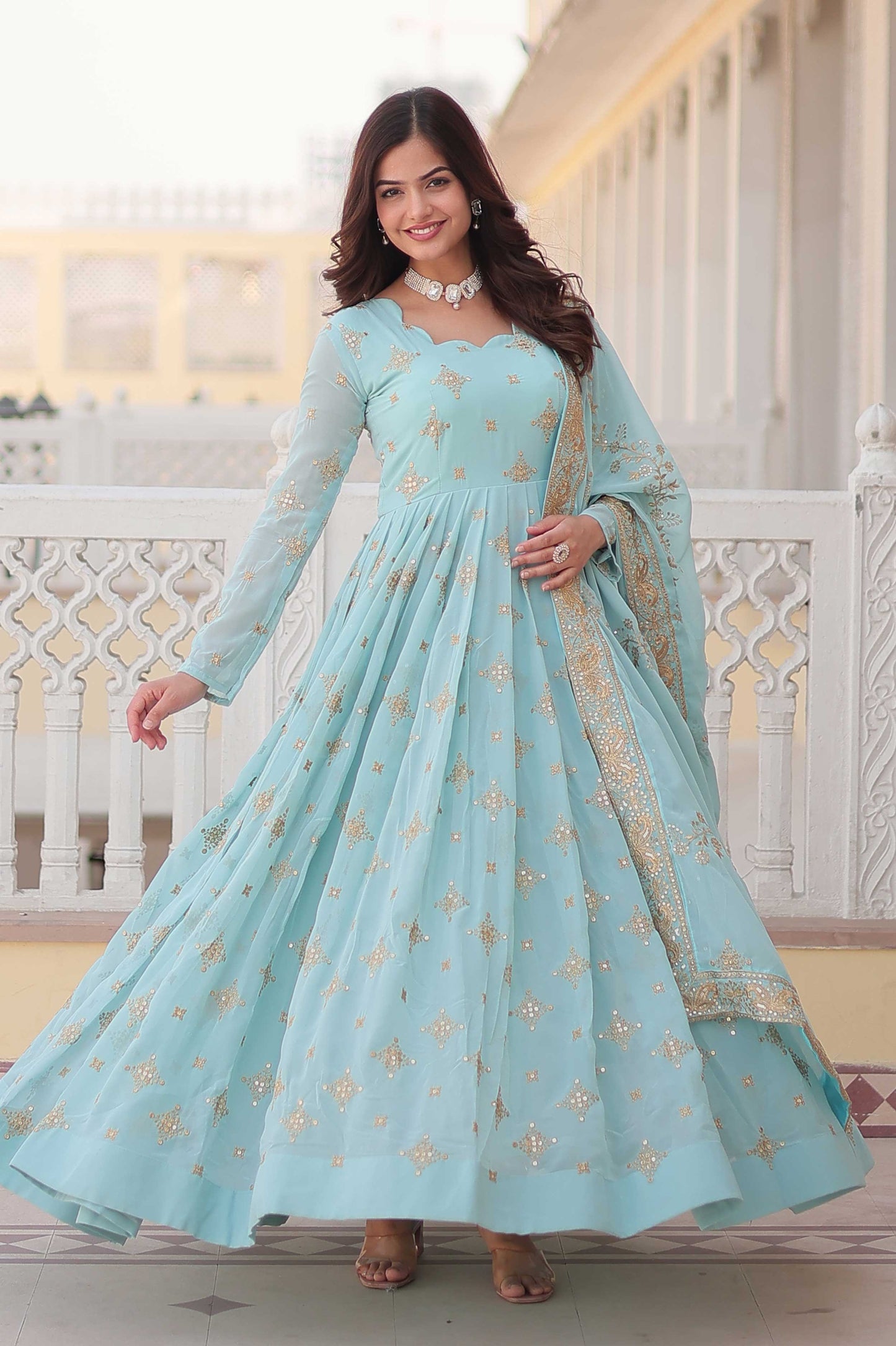 Spectacular Sky-Blue Embroidered Georgette Festival Wear Gown.