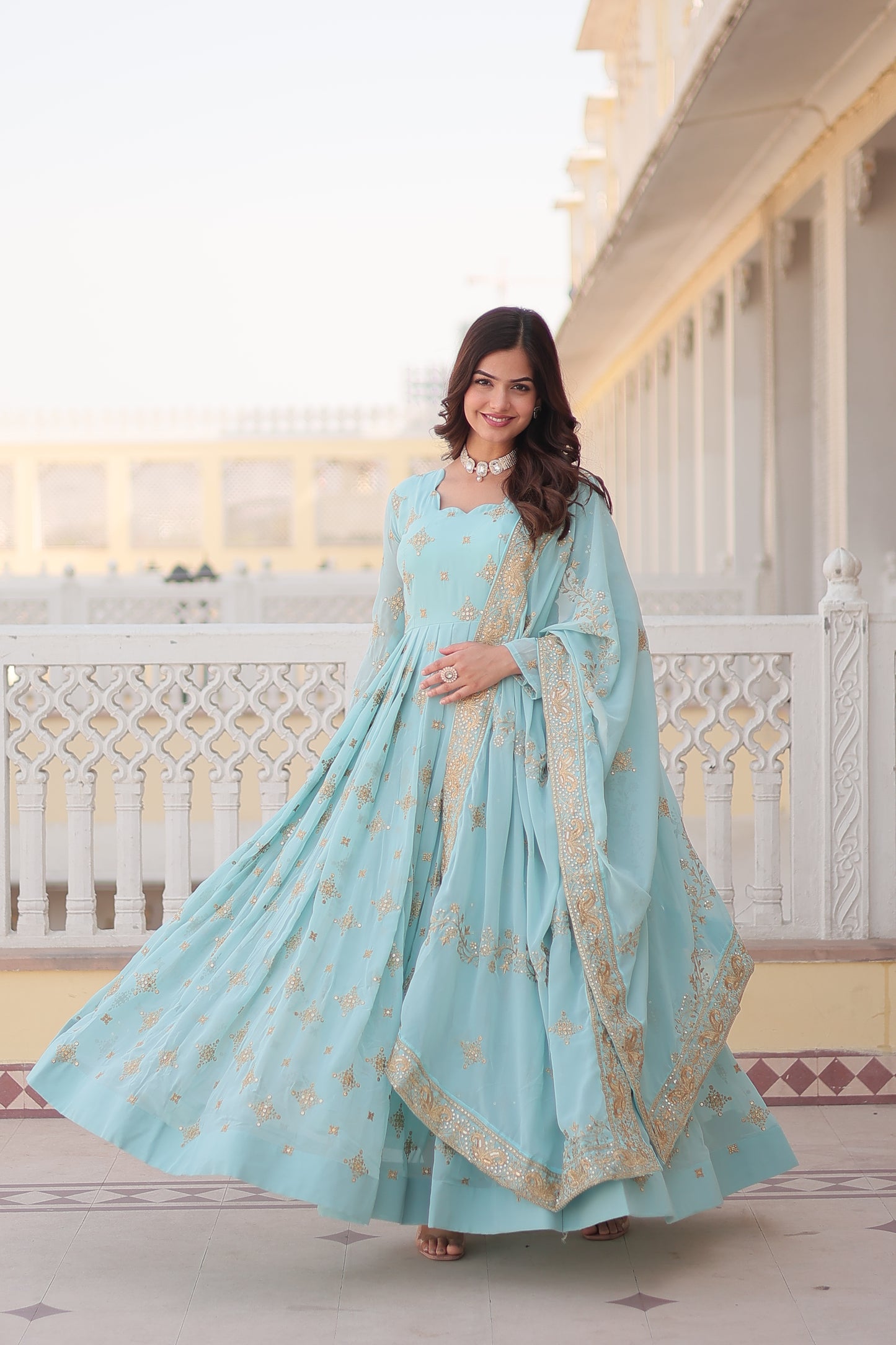 Spectacular Sky-Blue Embroidered Georgette Festival Wear Gown.