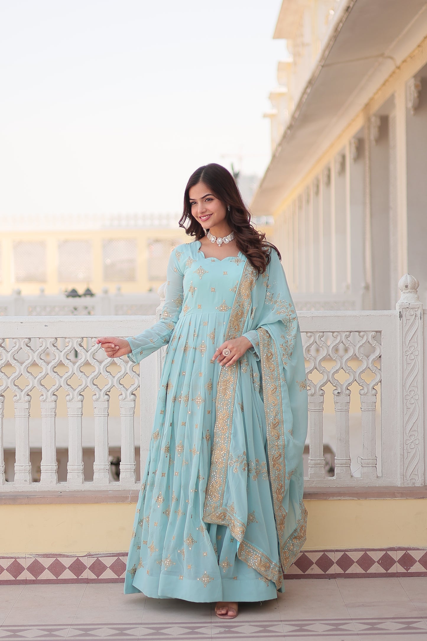 Spectacular Sky-Blue Embroidered Georgette Festival Wear Gown.