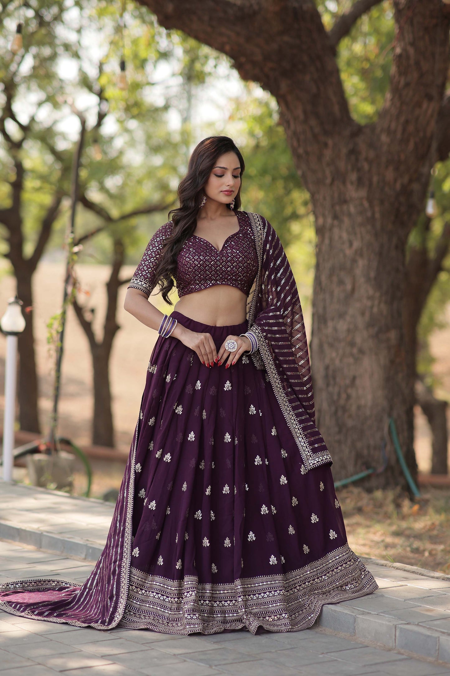 Embroidered Flared Lehenga Choli Set with Dupatta.