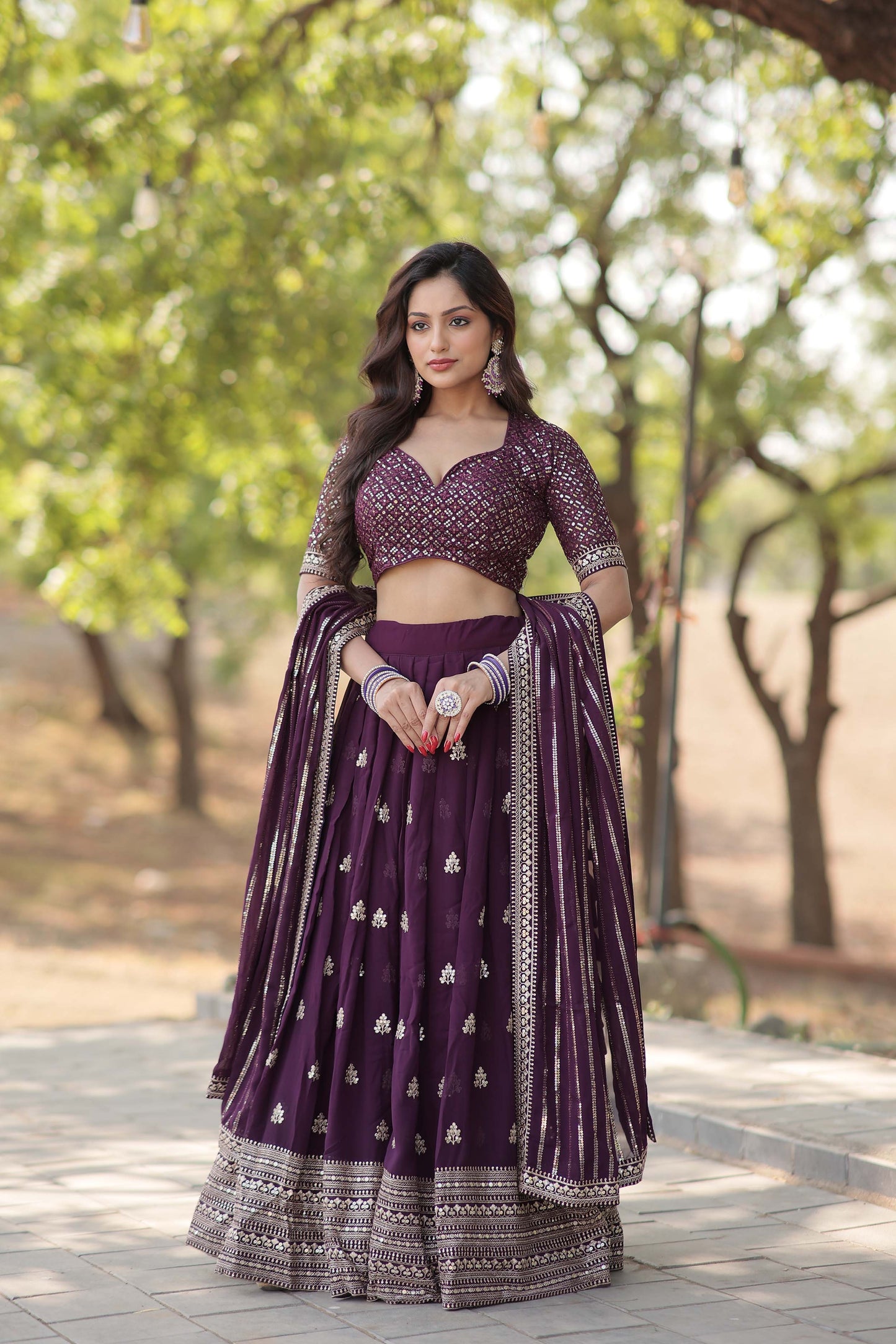 Embroidered Flared Lehenga Choli Set with Dupatta.