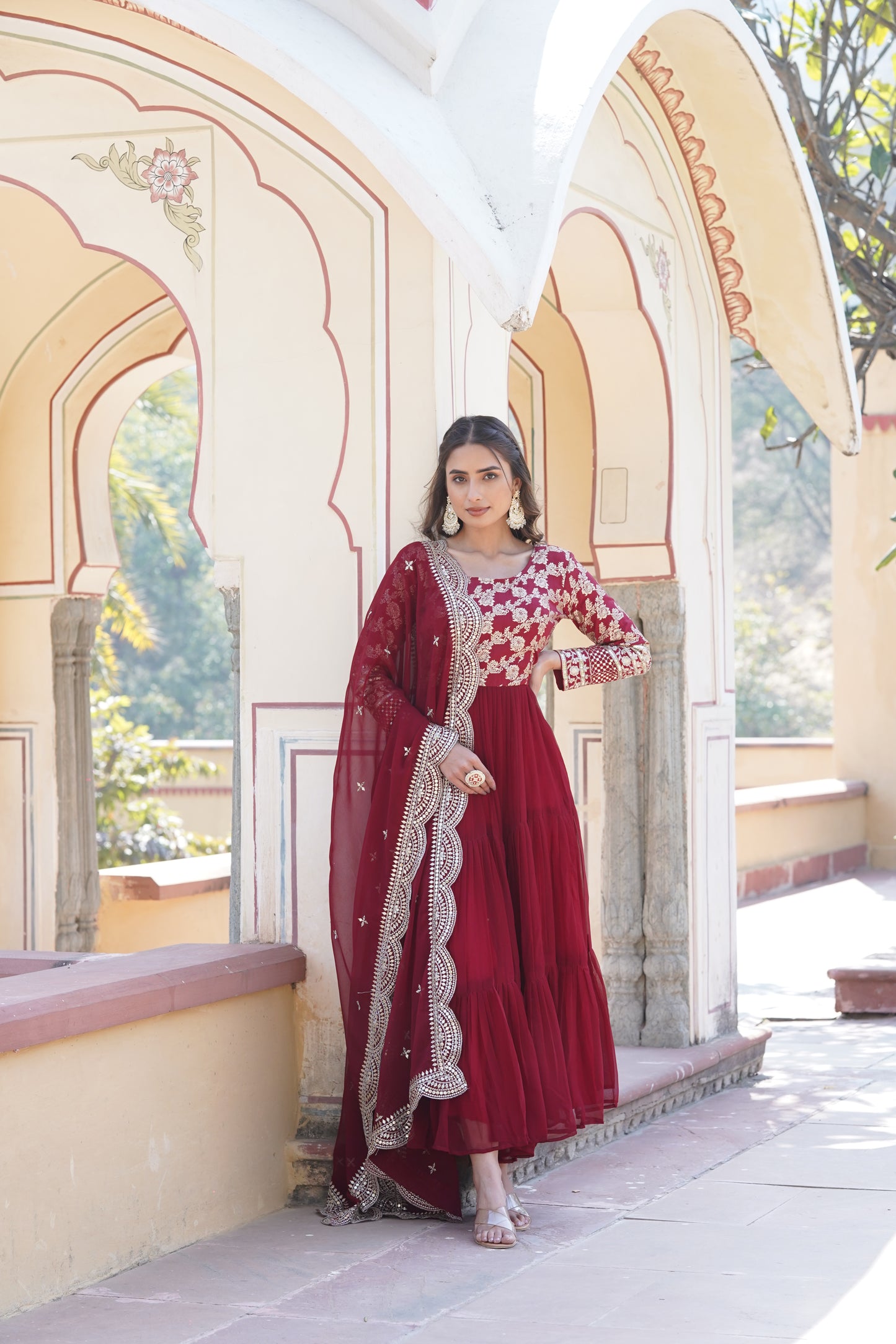 This fully flare dress is paired with lovely organza Bandhni Dupatta which gives perfect ethnic look with Golden embroidery Work Yok for your Indian traditional gathering and parties.