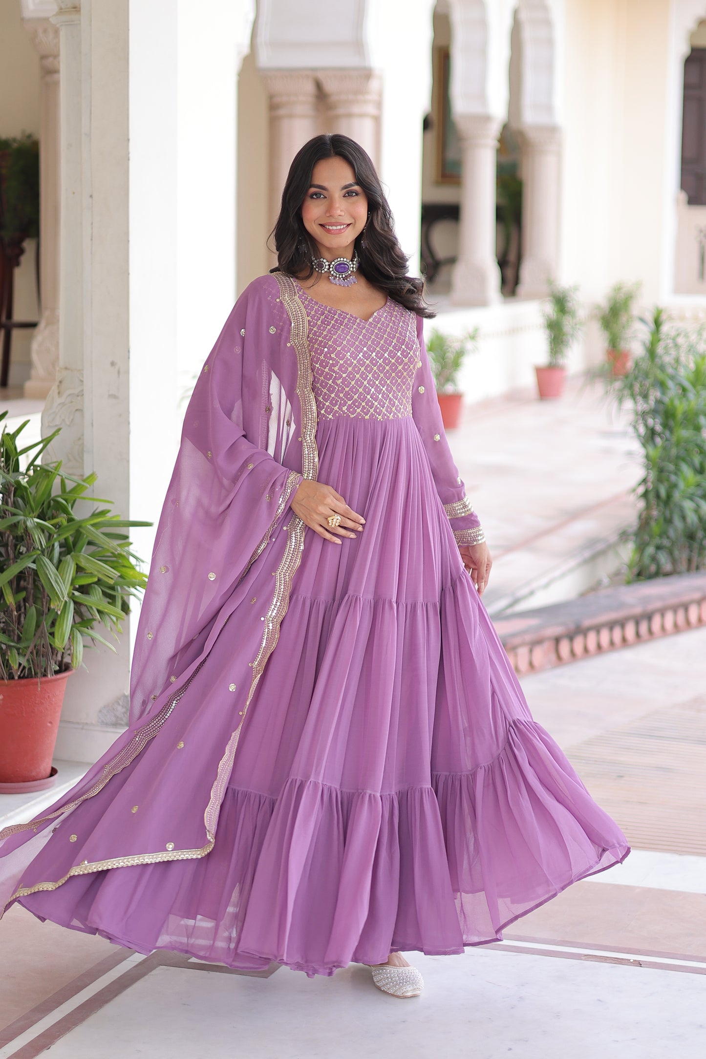 Faux Georgette gown with With Sequins Zari Embroidered