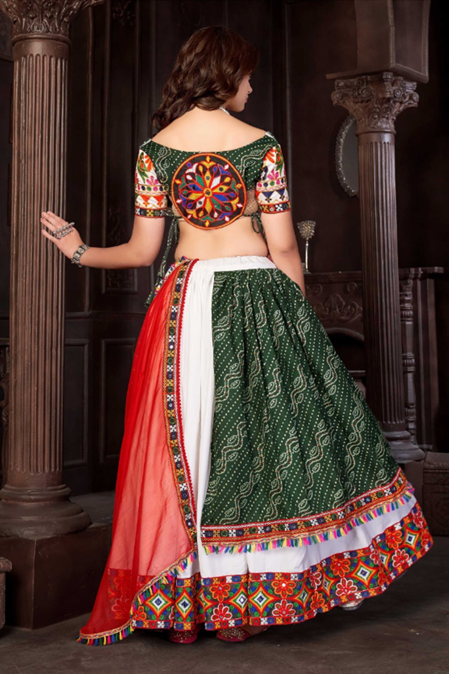 Navratri Special Green and white Mirror Bandhani lehenga choli with Red Duptta set.