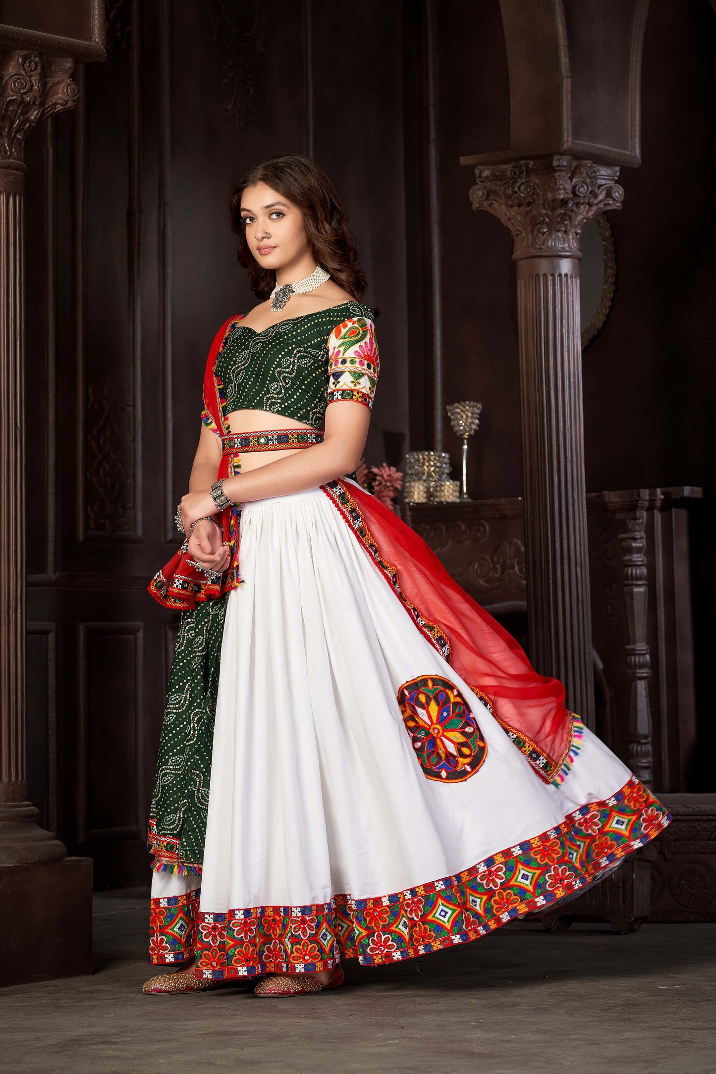 Navratri Special Green and white Mirror Bandhani lehenga choli with Red Duptta set.