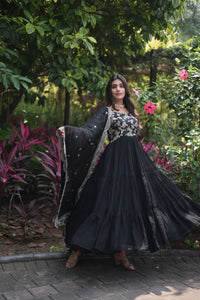 This fully flare dress is paired with lovely organza Bandhni Dupatta which gives perfect ethnic look with Golden embroidery Work Yok for your Indian traditional gathering and parties.