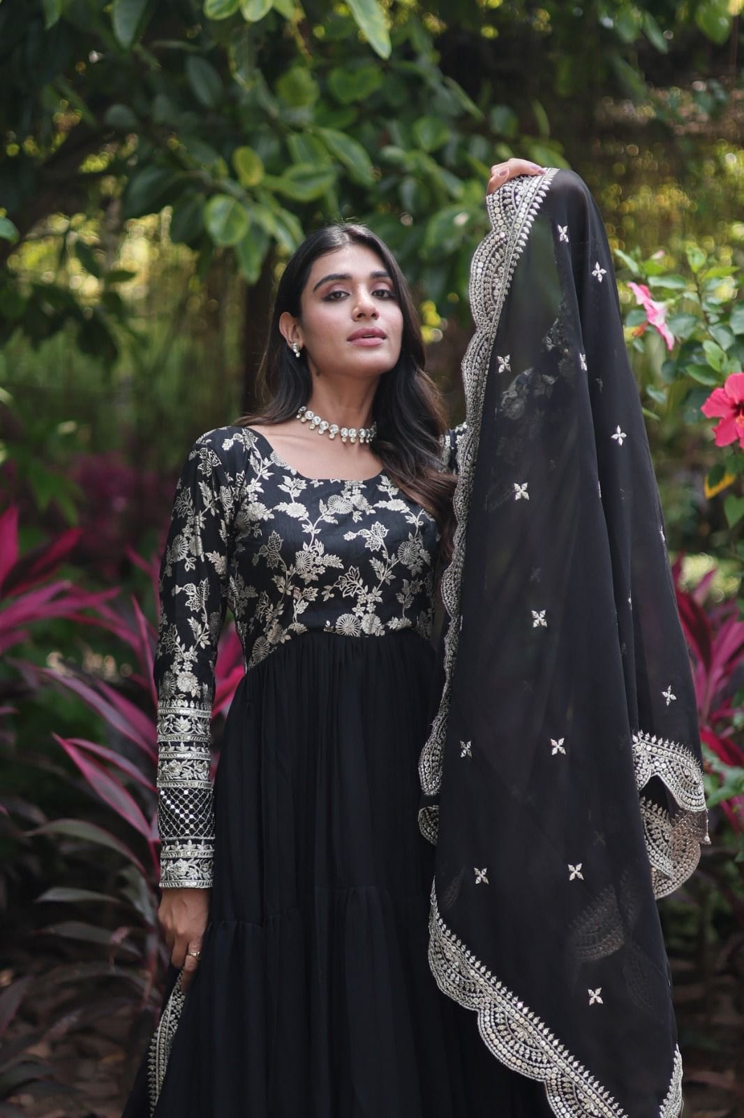 This fully flare dress is paired with lovely organza Bandhni Dupatta which gives perfect ethnic look with Golden embroidery Work Yok for your Indian traditional gathering and parties.